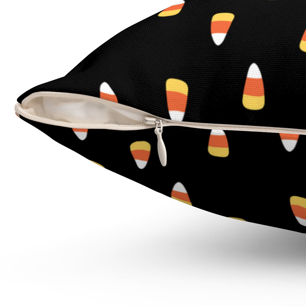 Halloween-themed graphic pillow cover featuring vibrant designs like candy corn, jack-o-lanterns, spooky cats, skeletons, and skulls, made from soft spun polyester for festive seasonal decor.