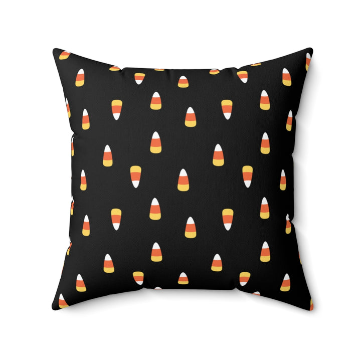 Halloween-themed graphic pillow cover featuring vibrant designs like candy corn, jack-o-lanterns, spooky cats, skeletons, and skulls, made from soft spun polyester for festive seasonal decor.