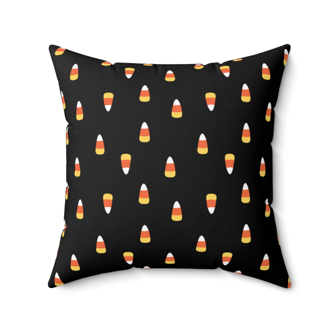 Halloween-themed graphic pillow cover featuring vibrant designs like candy corn, jack-o-lanterns, spooky cats, skeletons, and skulls, made from soft spun polyester for festive seasonal decor.