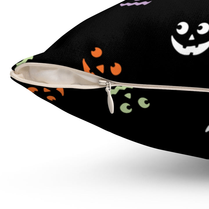 Halloween-themed graphic pillow cover featuring vibrant designs like jack-o-lanterns, spooky cats, skeletons, and skulls, made from soft spun polyester for festive seasonal decor.