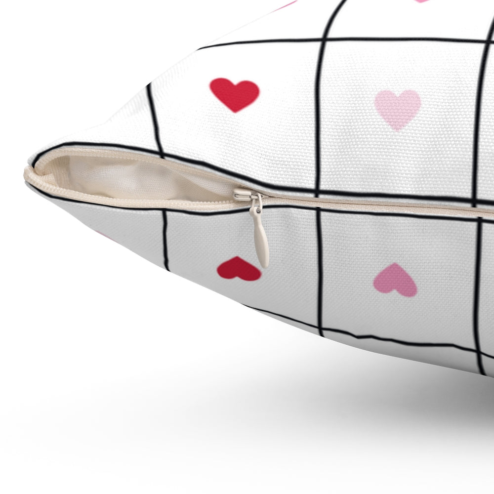 Valentine’s Day pillow cover with pink, red, and white plaid and heart-shaped graphics, perfect for seasonal home decor.