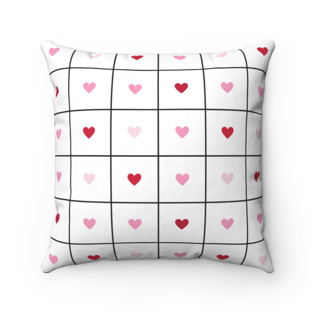 Valentine’s Day pillow cover with pink, red, and white plaid and heart-shaped graphics, perfect for seasonal home decor.